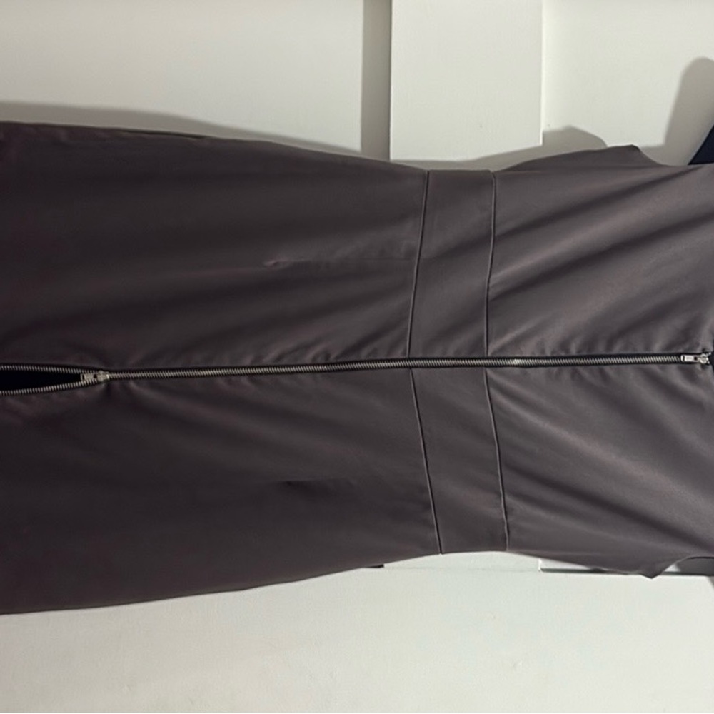 Expresso colored slim fit modern, and effortlessly chic dress.